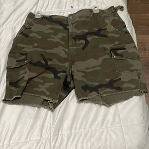 Green, black and brown shorts